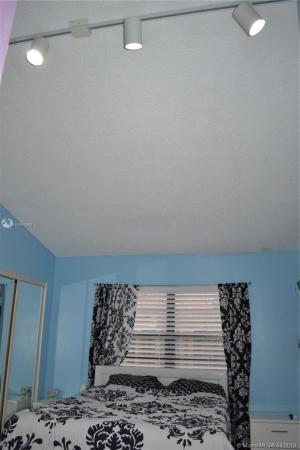 Villa Homes At The Moors, 6117 NW 171st St #6117, Country Club, Florida 33015, image 2