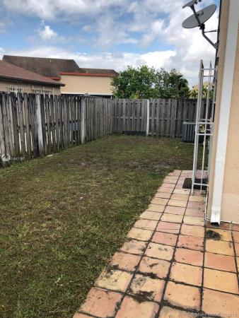 Country Lake Homes, 18864 NW 63rd Ct Cir, Country Club, Florida 33015, image 2