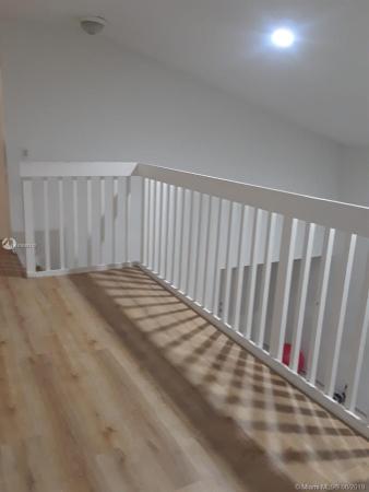 The Moors Cluster Homes, 18128 NW 63rd Ct, Country Club, Florida 33015, image 2