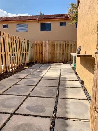 Belleview Villas, 17334 NW 74th Ave #201, Country Club, Florida 33015, image 2