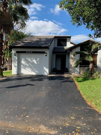 The Moors Cluster Homes, 6308 NW 174th Ter, Country Club, Florida 33015, image 2