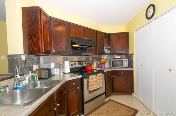 Mediterranean Villas, 6280 NW 186th St #301, Country Club, Florida 33015, image 2