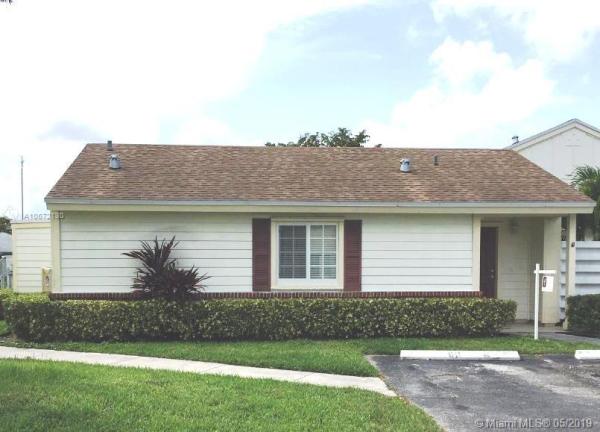 Village Homes At Country Walk, 14700 SW 139th Ave #3-40, Country Walk, Florida 33186, image 2