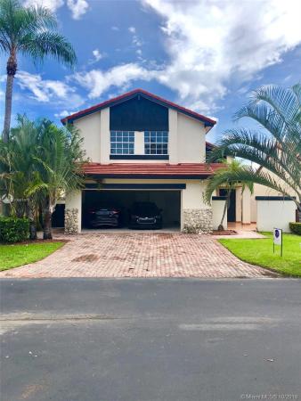 The Moors Cluster Homes, 6365 NW 173rd St, Country Club, Florida 33015, image 2