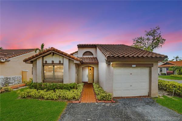 The Moors Cluster Homes, 6334 NW 173rd Ln, Country Club, Florida 33015, image 2