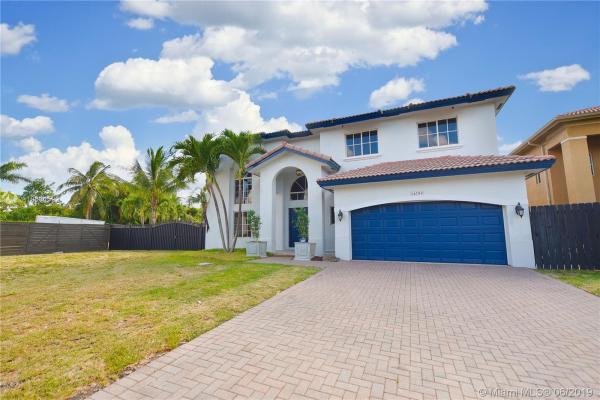Milon Venture, 14788 SW 158th Path, Country Walk, Florida 33196, image 2