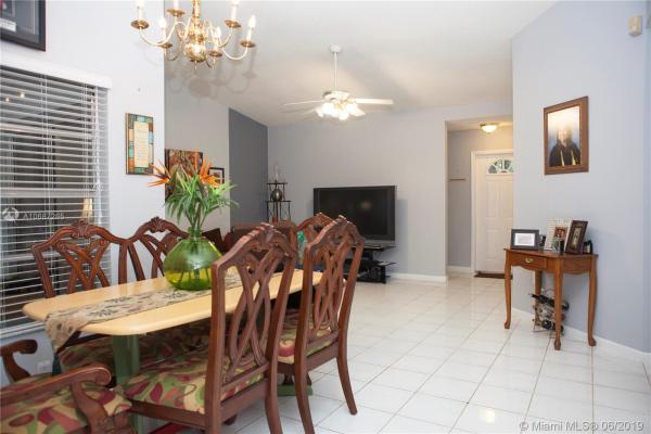 Country Lake Homes, 18934 NW 63rd Ct Cir, Country Club, Florida 33015, image 2