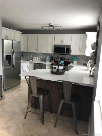 Vista Alegre Townhomes, 15300 SW 134th Pl #208, Three Lakes, Florida 33177, image 2