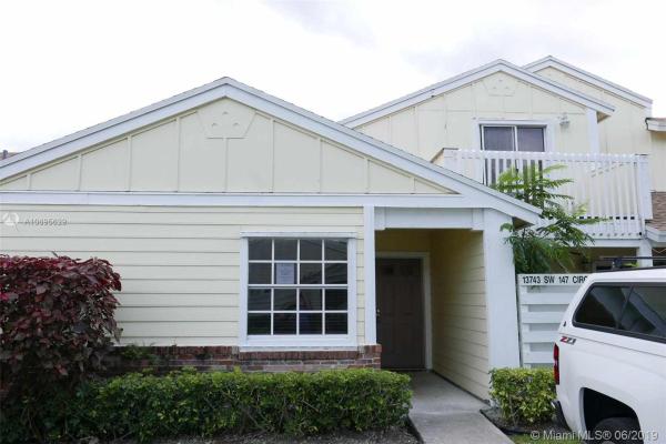 Village Homes At Country Walk, 13743 SW 147th Cir Ln #4-34, Country Walk, Florida 33186, image 2