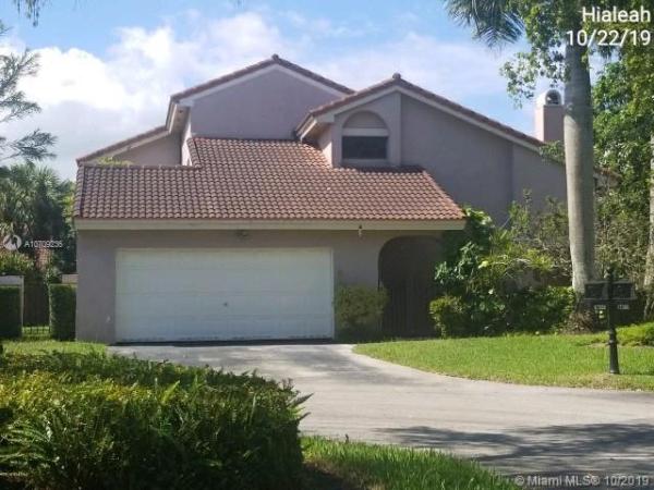 The Moors Townhouses, 17358 NW 66th Ct, Country Club, Florida 33015, image 2