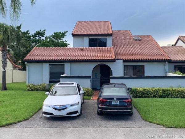 The Moors Townhouses, 18144 NW 66th Ct #18144, Country Club, Florida 33015, image 2