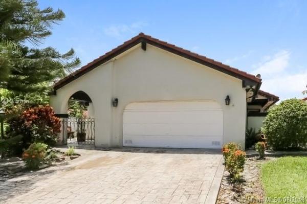Patio Homes At The Moors, 17346 NW 62nd Ct, Country Club, Florida 33015, image 2