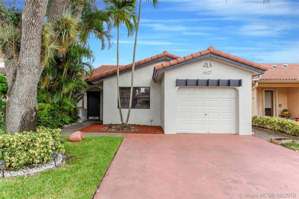 The Moors Townhouses, 6627 NW 174th Ln, Country Club, Florida 33015, image 2