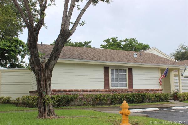 Village Homes At Country Walk, 13719 SW 147th Cir Ln #3-1, Country Walk, Florida 33186, image 2