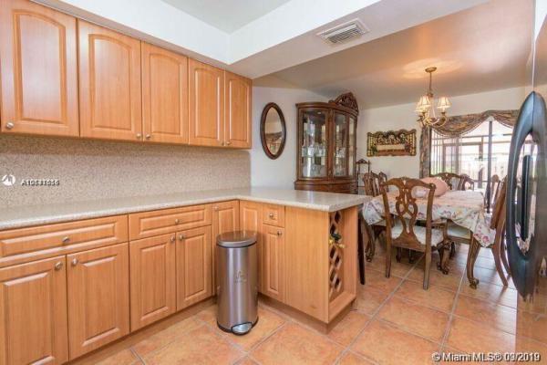 The Moors Townhouses, 17846 NW 66th Ct Cir #17846, Country Club, Florida 33015, image 2