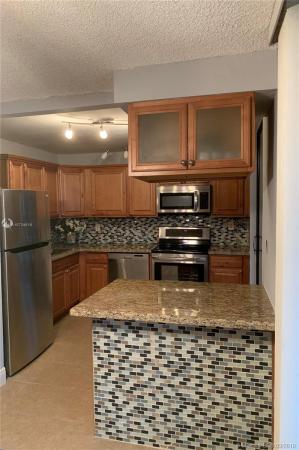 Coco Wood, 661 NE 195th St #407, Ives Estates, Florida 33179, image 2