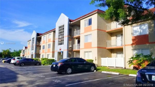 Villa Rustica, 18890 NW 57 Ave #101, Country Club, Florida 33015, image 2