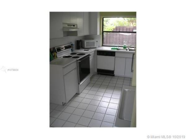 Villa Homes At The Moors, 17252 NW 60th Ct #17252, Country Club, Florida 33015, image 2