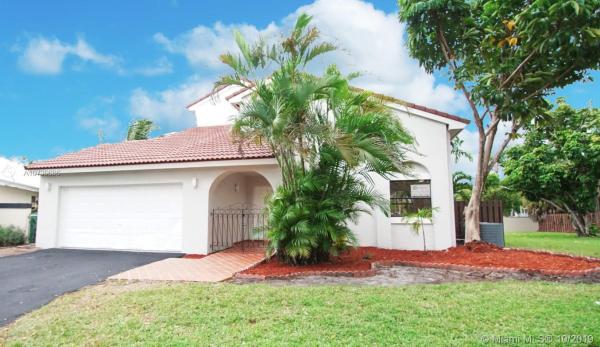 Patio Homes At The Moors, 17313 NW 62nd Ct, Country Club, Florida 33015, image 2