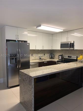 Countryside Village, 18995 NW 62nd Ave #107, Country Club, Florida 33015, image 2