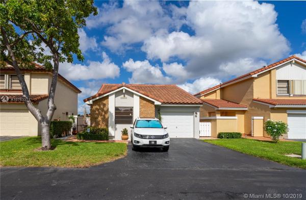 The Moors Cluster Homes, 17314 NW 63rd Pl, Country Club, Florida 33015, image 2