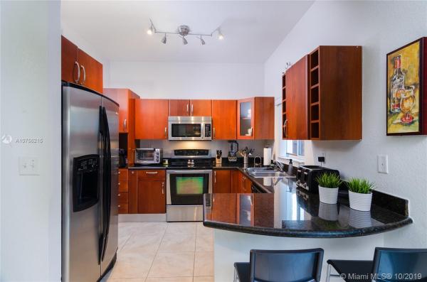 Tuscan Lake Villas, 7459 NW 179th Ter #7459, Country Club, Florida 33015, image 2