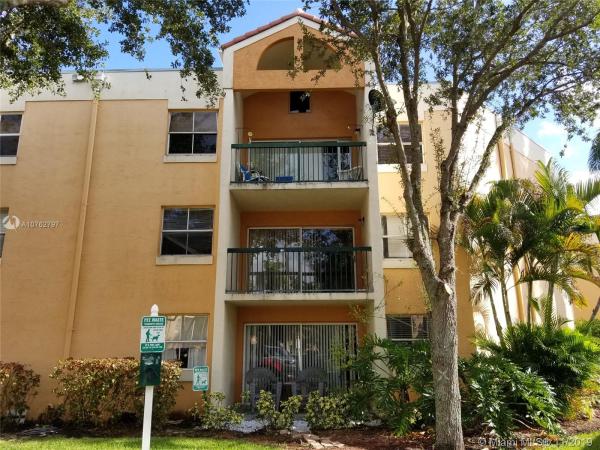 Mediterranean Villas, 6276 NW 186 St #205, Country Club, Florida 33015, image 2