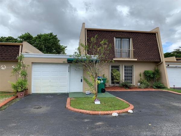 Fairway Villas, 19115 W Lake Dr, Country Club, Florida 33015, image 2