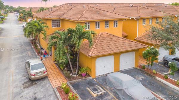 Lilandia Estates, 7579 NW 174th Ter #7579, Country Club, Florida 33015, image 2