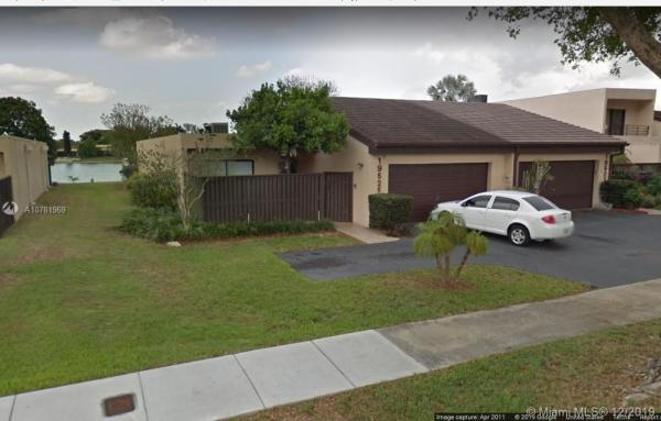 Royal Singapore Lake, 19525 W Lake Dr #19525, Country Club, Florida 33015, image 2