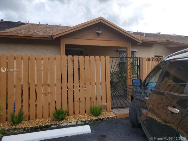 Aspen Townhomes, 6708 NW 192nd Ter, Country Club, Florida 33015, image 2
