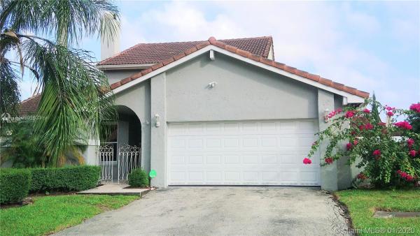 Patio Homes At The Moors, 17325 NW 62nd Ct, Country Club, Florida 33015, image 2