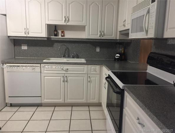 Villas At Carriage Hills Lakeside, 275 Gate Rd #115, Hollywood, Florida 33024, image 1