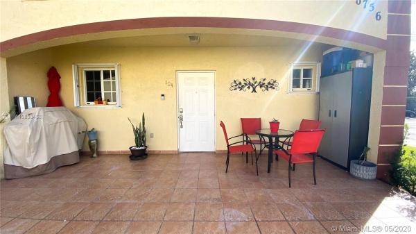 Marquis Villas, 6756 NW 182nd St #104, Country Club, Florida 33015, image 2