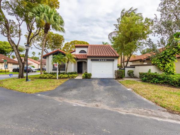The Moors Cluster Homes, 6220 NW 181st Ter, Country Club, Florida 33015, image 2