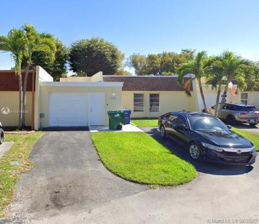 Fairway Villas, 7337 Stardust Dr, Country Club, Florida 33015, image 2