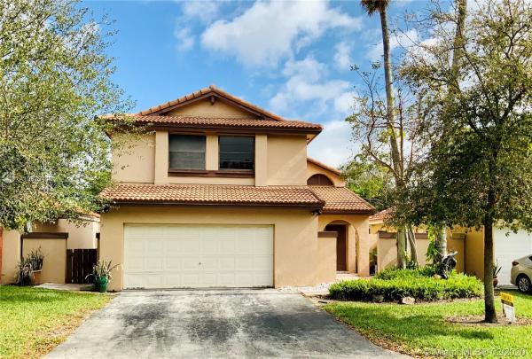 The Moors Cluster Homes, 6305 NW 173rd Ln, Country Club, Florida 33015, image 2