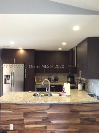 The Moors Cluster Homes, 17625 NW 62nd Ct, Country Club, Florida 33015, image 2