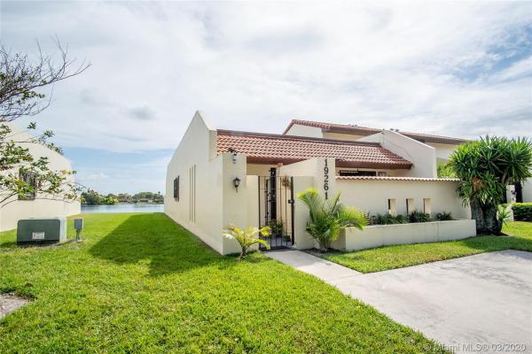 Townhomes Of Country Lake, 19261 NW 64th Ct, Country Club, Florida 33015, image 2