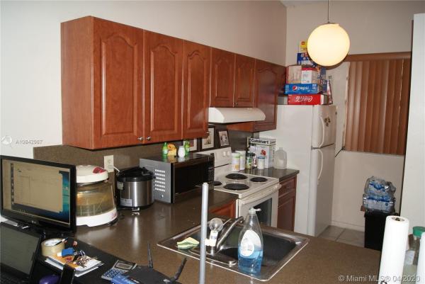 Aspen Townhomes, 6710 NW 188th Ter, Country Club, Florida 33015, image 2