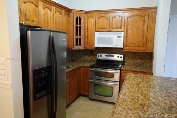 Countryside Village, 19085 NW 62nd Ave #203, Country Club, Florida 33015, image 2