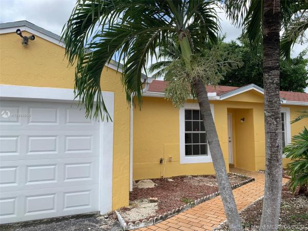 Country Lake Homes, 18975 NW 63rd Ct Cir, Country Club, Florida 33015, image 2