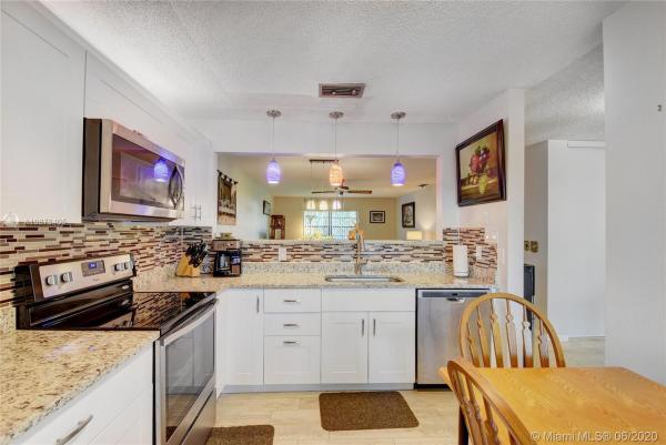 Indian Trail Villas, 97 Conaskonk Cir, Royal Palm Beach, Florida 33411, image 2