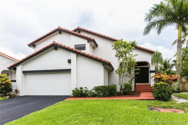 Patio Homes At The Moors, 17715 NW 62nd Pl N, Country Club, Florida 33015, image 2