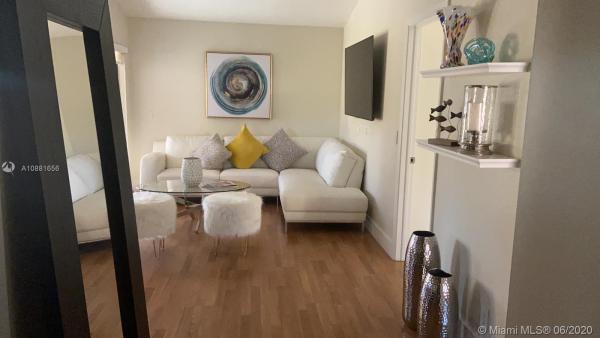 Villa Homes At The Moors, 6352 NW 171st St #6352, Country Club, Florida 33015, image 2