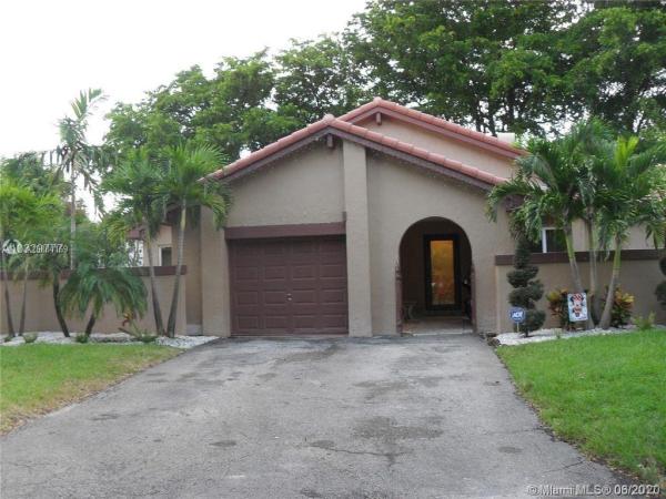 Patio Homes At The Moors, 17324 NW 62nd Pl, Country Club, Florida 33015, image 2