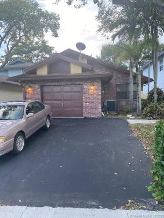 Homes Of Lakeridge, 593 NE Lakeside Cir, Sunrise, Florida 33326, image 2