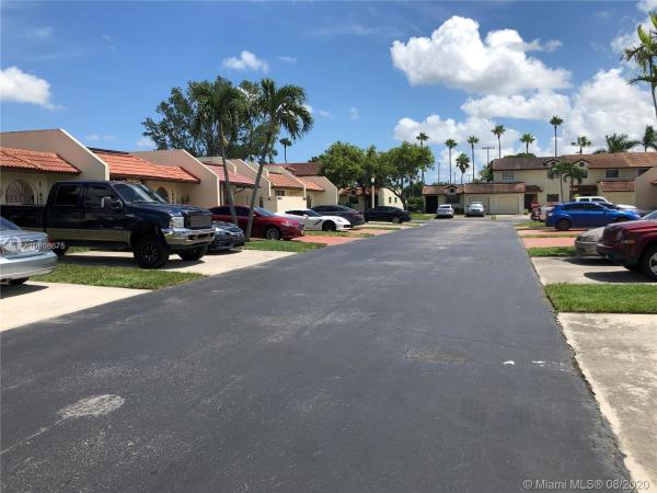 Townhomes Of Country Lake, 18865 NW 65th Ct, Country Club, Florida 33015, image 2