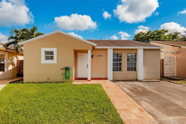 Country Lake Homes, 6721 NW 199th Ter, Country Club, Florida 33015, image 2