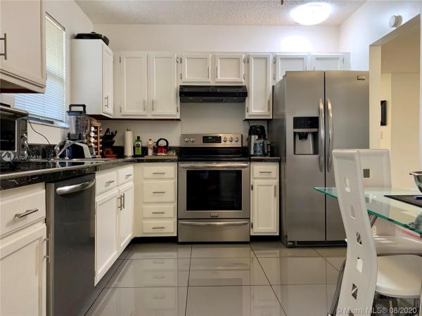 Summertree Village, 461 Ives Dairy Rd #403-2, Ives Estates, Florida 33179, image 2